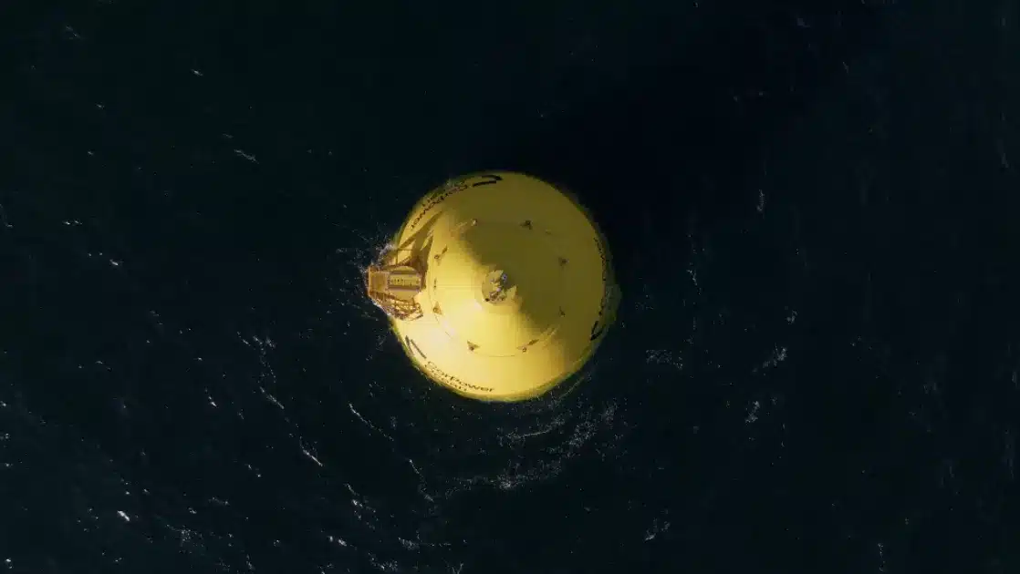 Aerial view of CorPower Ocean's wave energy converter in open sea.